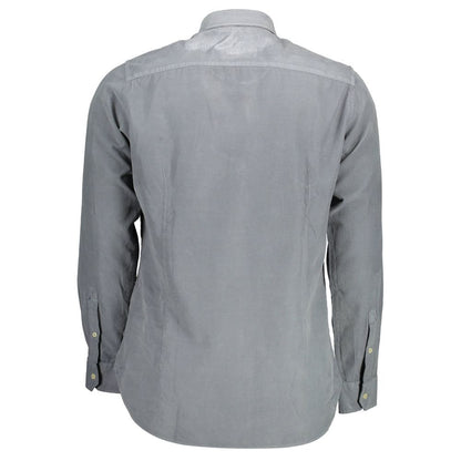 Dress Shirt by U.S. POLO ASSN. for men in cotton blue showcases a sharp silhouette, elegantly detailed with a sharp and sharp .