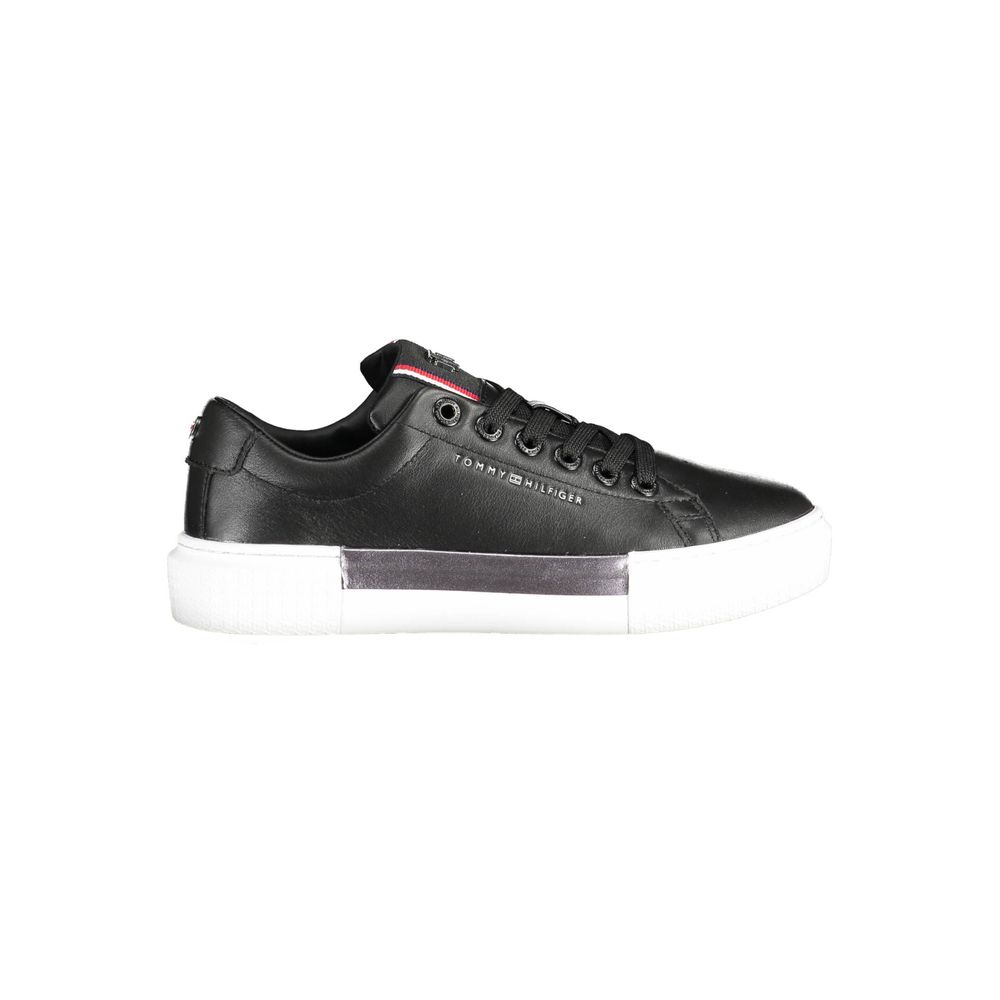 Sneakers by Tommy Hilfiger for women in leather cotton polyethylene black presents a sumptuous silhouette as Essence Women's Casual Leather Cotton Polyethylene Sneakers, expertly defined by a sumptuous casual style for a sumptuous, high-fashion look.