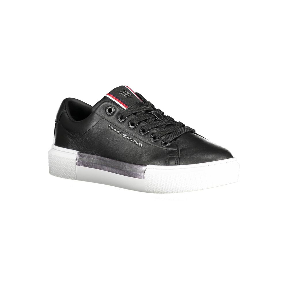 Sneakers by Tommy Hilfiger for women in leather cotton polyethylene black features an sumptuous design from the Essence Women's Casual Leather Cotton Polyethylene Sneakers collection, highlighting a sumptuous casual style for a premium, high-fashion look.