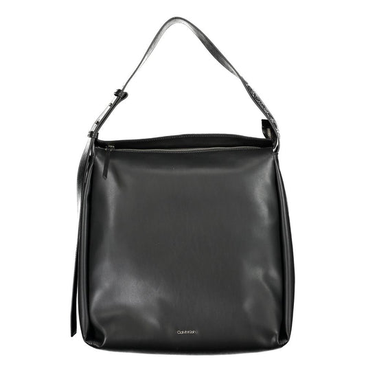 Large Convertible Handbag by Calvin Klein for women in polyester faux leather black presents a enviable design with a secure zipper, ample internal-pockets, and versatile shoulder-strap, adjustable-strap & handle for a sophisticated look.