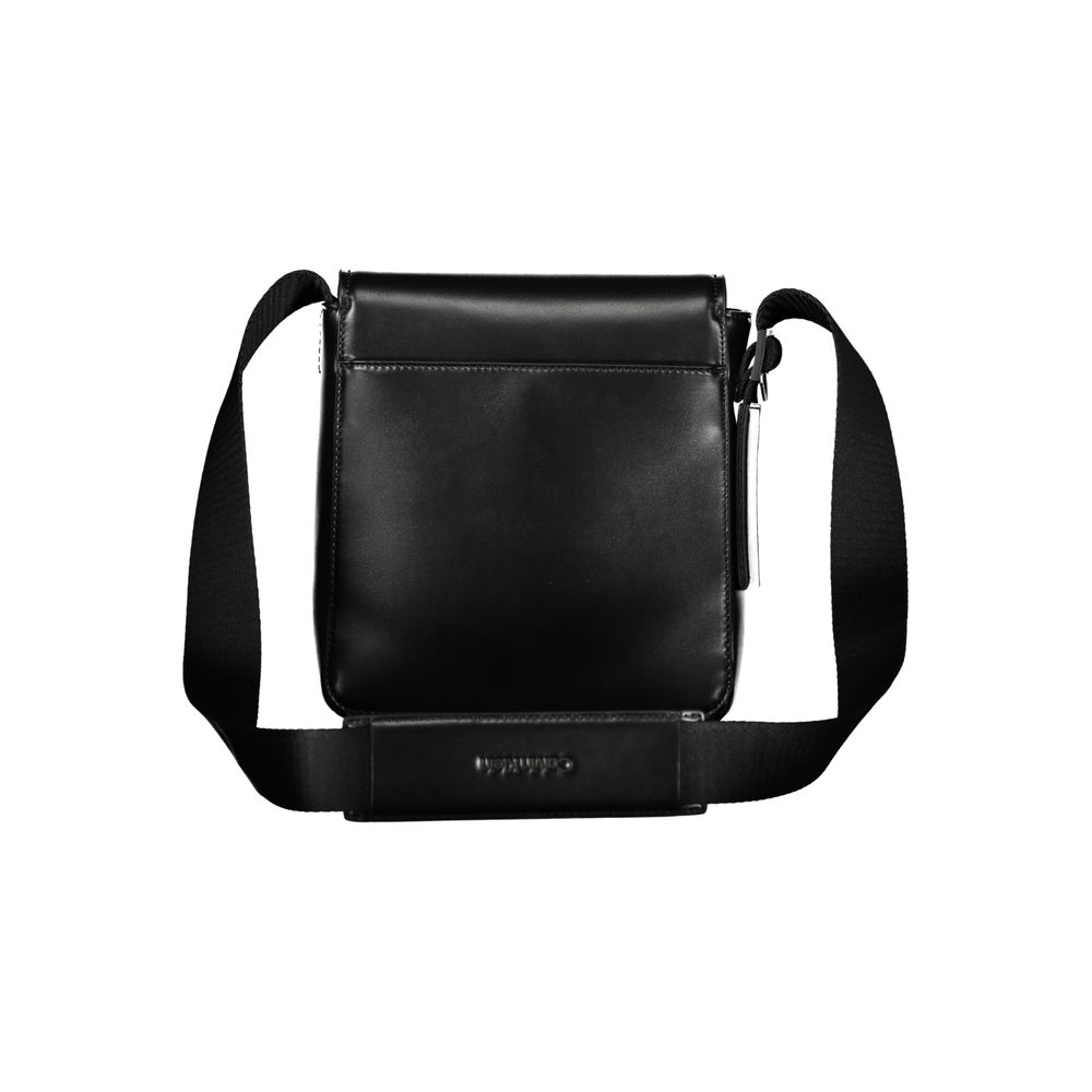 Shoulder Bag by Calvin Klein for men in polyester & polyethylene black features a effortless sophistication silhouette, secured by a magnetic with ample external-pockets and versatile shoulder-strap & adjustable-strap for a effortless sophistication finish.