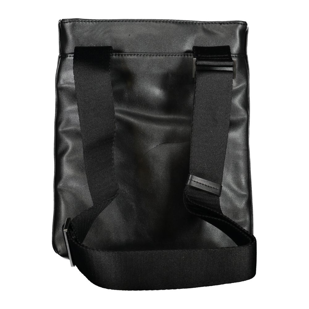Shoulder Bag by Calvin Klein for men in polyester & polyethylene black & signature presents a statuesque silhouette, showcasing a secure zipper and statuesque external-pockets & internal-pockets with versatile shoulder-strap & adjustable-strap for a sophisticated look.
