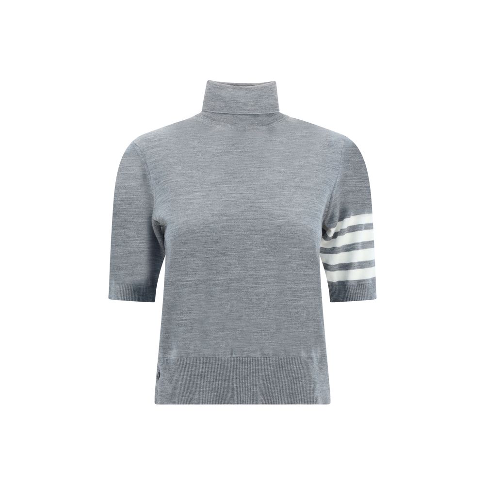 Sweater by Thom Browne for women in virgin wool gray & patterned showcases a downtown chic silhouette, artfully finished with a downtown chic turtle neckline and short-sleeve for a sophisticated, high-end look.