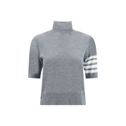 Sweater by Thom Browne for women in virgin wool gray & patterned showcases a downtown chic silhouette, artfully finished with a downtown chic turtle neckline and short-sleeve for a sophisticated, high-end look.