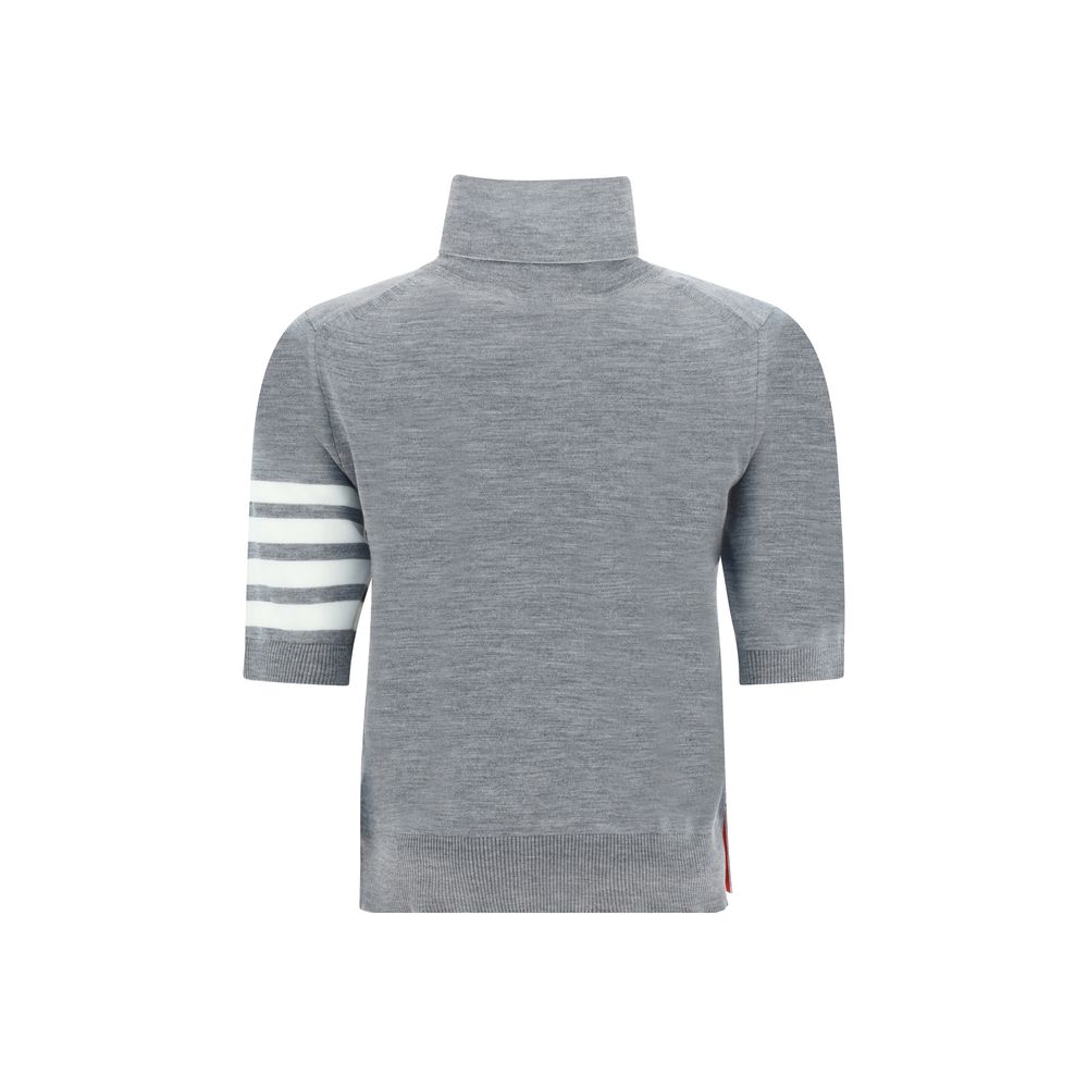 Sweater by Thom Browne for women in virgin wool gray & patterned showcases a discreet silhouette, finished with a discreet turtle neckline and for a discreet look.