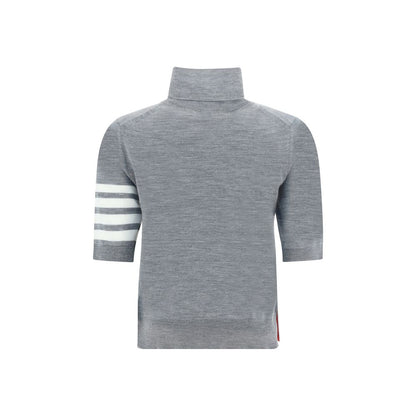 Sweater by Thom Browne for women in virgin wool gray & patterned showcases a discreet silhouette, finished with a discreet turtle neckline and for a discreet look.