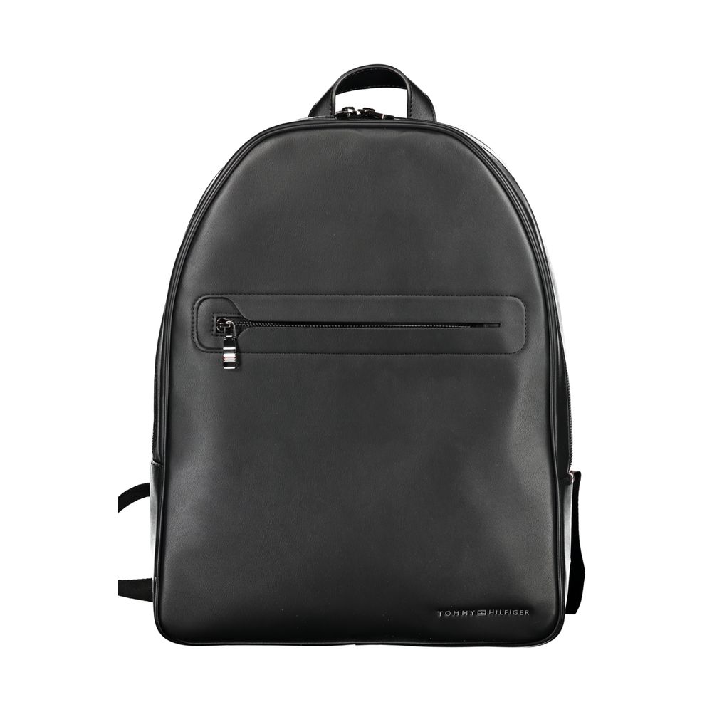 Backpack by Tommy Hilfiger for men in polyester black & signature features a stately Polyester Backpack design, showcasing a secure zipper, ample built-in-compartments, external-pockets, internal-pockets & laptop-compartment, and versatile backpack-strap, adjustable-strap & handle for a stately finish.