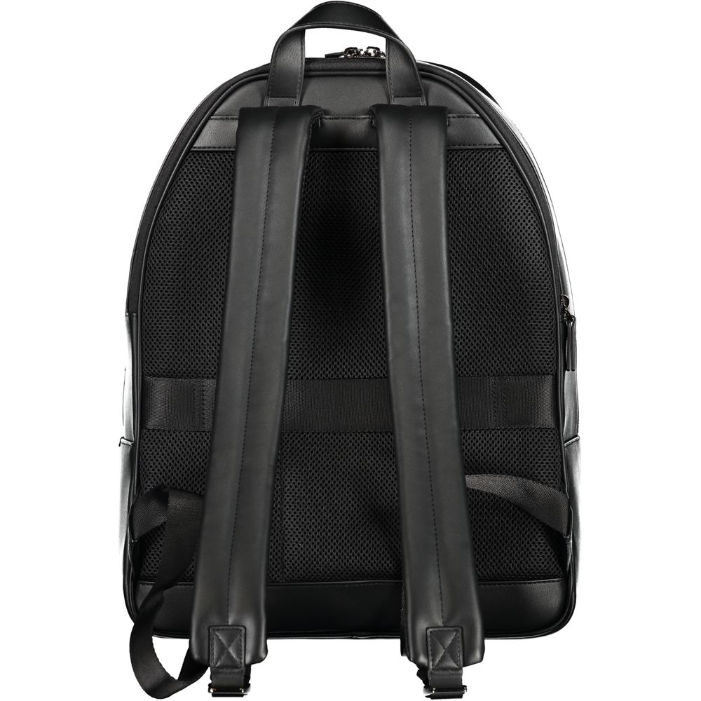 Backpack by Tommy Hilfiger for men in polyester black & signature presents a stately Polyester Backpack design, showcasing a secure zipper with ample built-in-compartments, external-pockets, internal-pockets & laptop-compartment and versatile backpack-strap, adjustable-strap & handle for a stately finish.