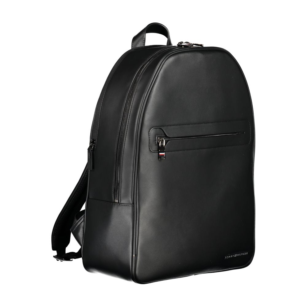Backpack by Tommy Hilfiger for men in polyester black & signature showcases a stately Polyester Backpack design, featuring a secure zipper with stately built-in-compartments, external-pockets, internal-pockets & laptop-compartment and versatile backpack-strap, adjustable-strap & handle.