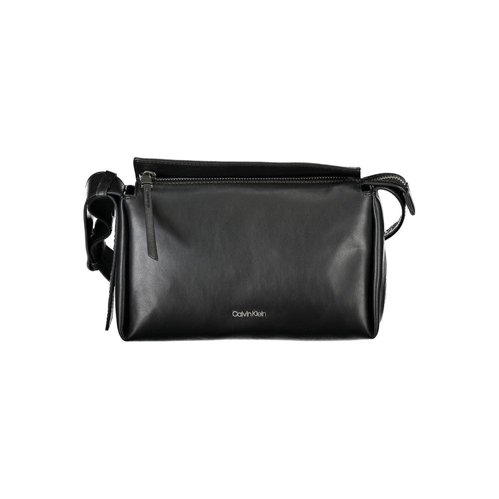 Shoulder Convertible Handbag by Calvin Klein for women in polyester faux leather black features a refined silhouette, showcasing a secure zipper and refined cardholder with versatile shoulder-strap & adjustable-strap for a refined finish.