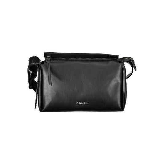 Shoulder Convertible Handbag by Calvin Klein for women in polyester faux leather black features a refined silhouette, showcasing a secure zipper and refined cardholder with versatile shoulder-strap & adjustable-strap for a refined finish.