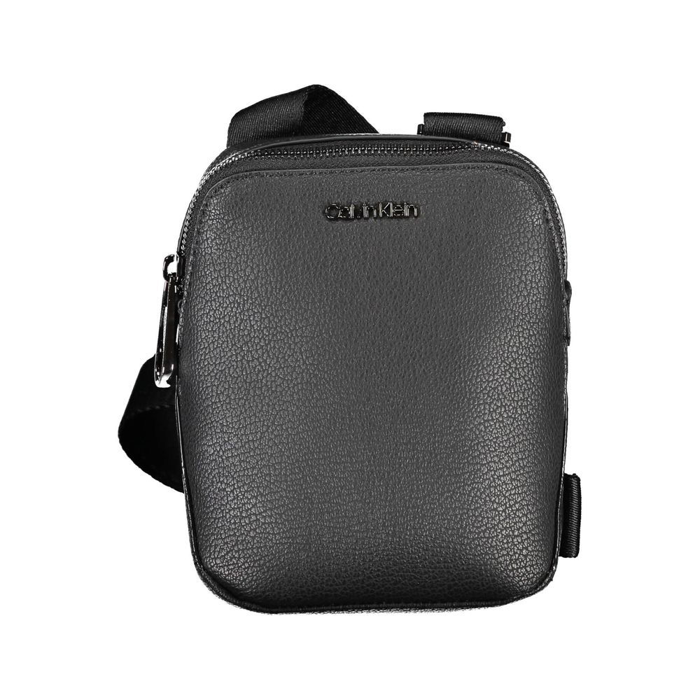 Shoulder Bag by Calvin Klein for men in polyester & polyethylene black showcases a statuesque silhouette, artfully detailed with a secure zipper, organized external-pockets, and versatile shoulder-strap & adjustable-strap for a statuesque look.