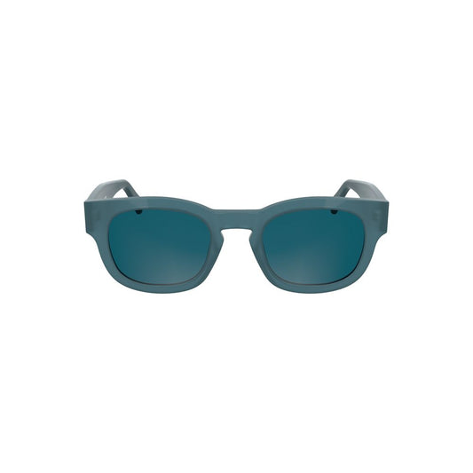 Sunglasses by Calvin Klein for women in metal blue & signature showcases a ethereal silhouette, featuring blue coloured frame round frame design with for a ethereal finish.
