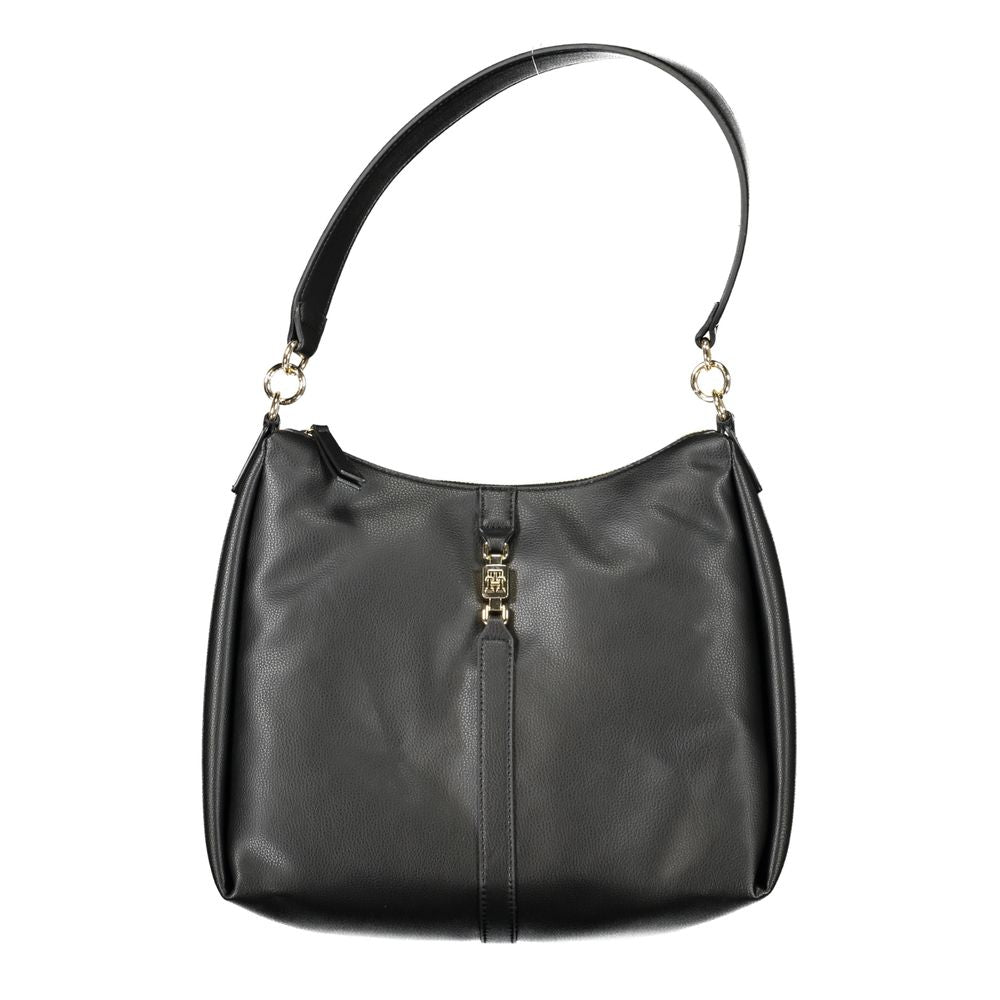 Convertible Handbag by Tommy Hilfiger for women in polyester faux leather black & signature features a exquisite silhouette with a secure zipper, ample internal-pockets, and versatile handle for a exquisite look.