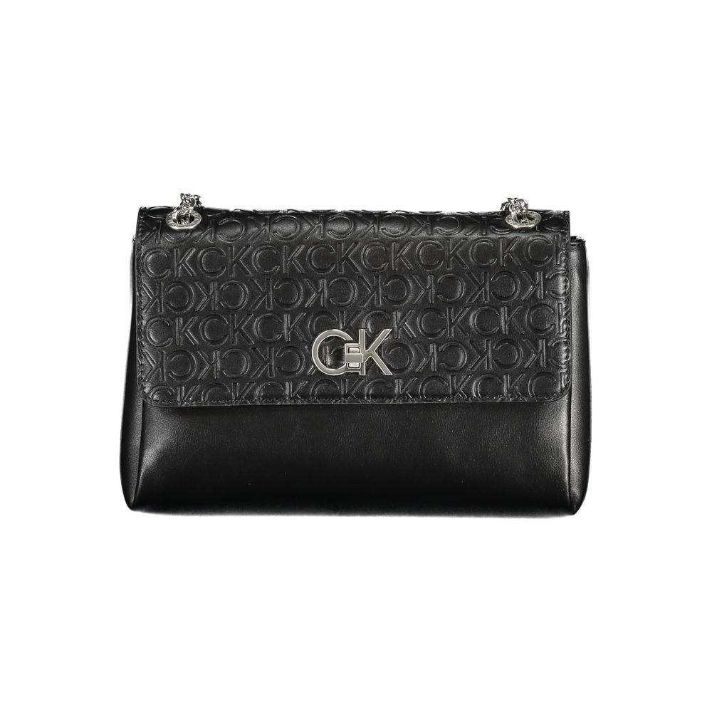 Shoulder Convertible Handbag by Calvin Klein for women in polyester faux leather black presents a enviable design with a secure , ample built-in-compartments, external-pockets & internal-pockets, and versatile shoulder-strap & handle for a sophisticated look.