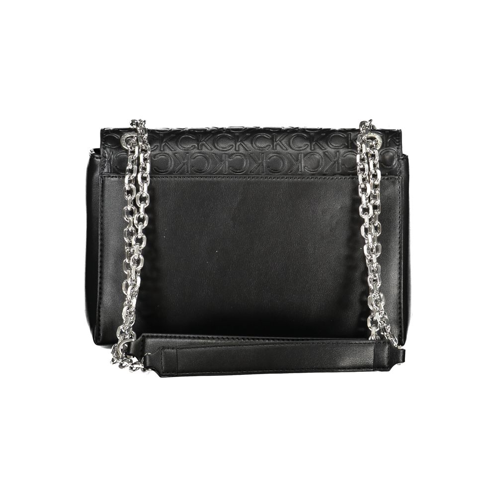 Shoulder Convertible Handbag by Calvin Klein for women in polyester faux leather black features a exquisite silhouette with a secure , ample built-in-compartments, external-pockets & internal-pockets, and versatile shoulder-strap & handle for a exquisite look.