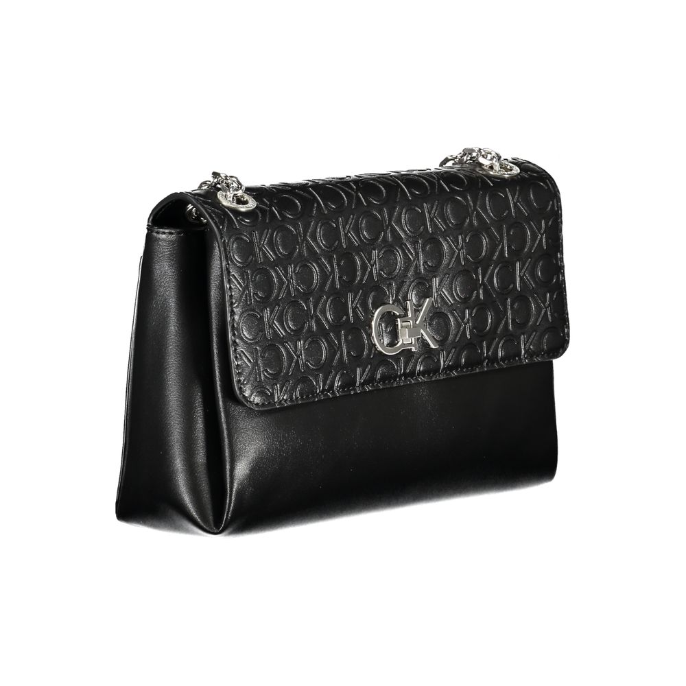 Shoulder Convertible Handbag by Calvin Klein for women in polyester faux leather black features an exquisite silhouette, showcasing a secure , ample built-in-compartments, external-pockets & internal-pockets, and exquisite shoulder-strap & handle for a sophisticated finish.