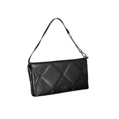 Shoulder Convertible Handbag by Calvin Klein for women in polyester faux leather black features a refined silhouette, showcasing a secure snap and refined cardholder with versatile shoulder-strap & handle for a refined finish.