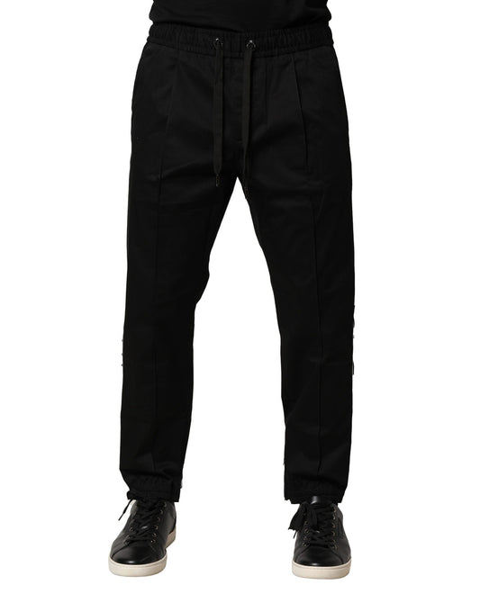 Joggers by Dolce & Gabbana for men in stretch cotton black features an refined tailoring silhouette, showcasing a premium regular-fit with a mid rise and long cut for a refined tailoring look.