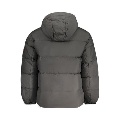 Hooded Windbreaker Jacket by Tommy Hilfiger for men in polyester black features an perennial silhouette with a refined hooded neckline and perennial pockets, hooded & windproof for a sophisticated weather-resistant look.