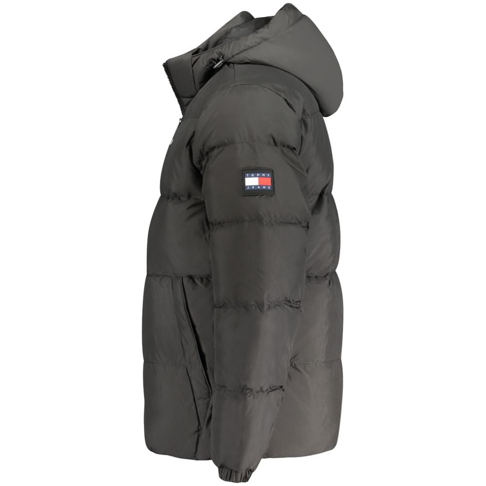 Hooded Windbreaker Jacket by Tommy Hilfiger for men in polyester black features an magnificent silhouette, showcasing the sophisticated and functional pockets, hooded & windproof for a premium, magnificent look.