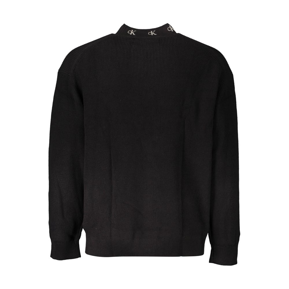 Sweater by Calvin Klein for men in cotton black showcases a downtown chic silhouette, artfully finished with a downtown chic and for a sophisticated, high-end look.