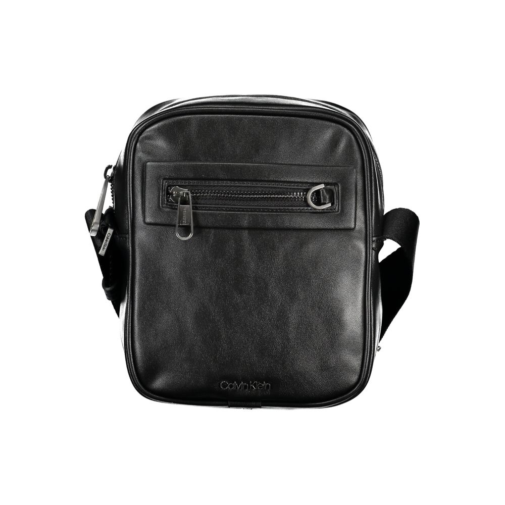 Shoulder Bag by Calvin Klein for men in polyester & polyethylene black showcases a statuesque silhouette, artfully detailed with a secure zipper, organized external-pockets & internal-pockets, and versatile shoulder-strap & adjustable-strap for a statuesque look.