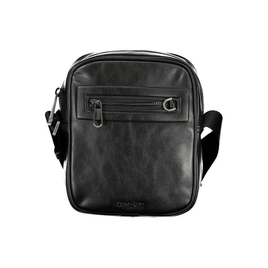 Shoulder Bag by Calvin Klein for men in polyester & polyethylene black showcases a statuesque silhouette, artfully detailed with a secure zipper, organized external-pockets & internal-pockets, and versatile shoulder-strap & adjustable-strap for a statuesque look.
