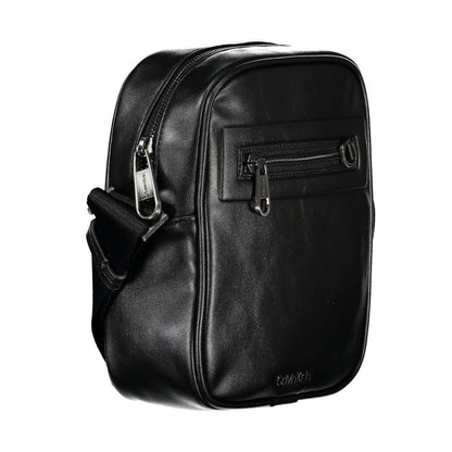 Shoulder Bag by Calvin Klein for men in polyester & polyethylene black presents a statuesque silhouette, showcasing a secure zipper and statuesque external-pockets & internal-pockets with versatile shoulder-strap & adjustable-strap for a sophisticated look.