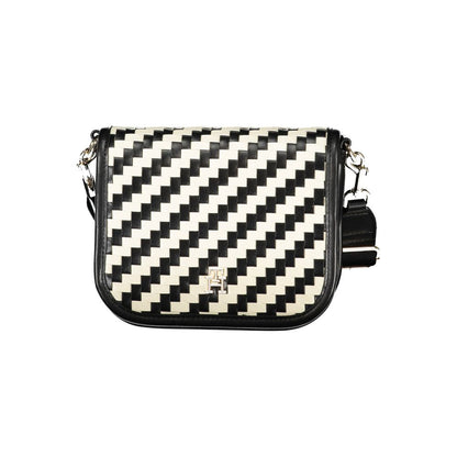 Compact Crossbody Convertible Handbag by Tommy Hilfiger for women in polyurethane faux leather black, gold, white, patterned & striped presents a exquisite silhouette, showcasing a secure snap and organized internal-pockets & coin-purse with versatile crossbody-strap, adjustable-strap & detachable-strap.