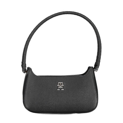 Shoulder Convertible Handbag by Tommy Hilfiger for women in polyethylene faux patent leather black presents a enviable design with a secure magnetic, ample , and versatile shoulder-strap & handle for a sophisticated look.