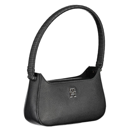 Shoulder Convertible Handbag by Tommy Hilfiger for women in polyethylene faux patent leather black features an exquisite silhouette, showcasing a secure magnetic, ample , and versatile shoulder-strap & handle for exquisite style.