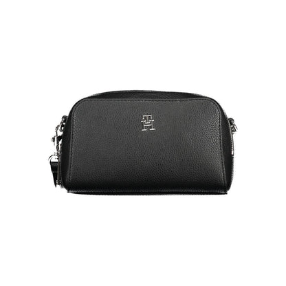 Shoulder Handbag by Tommy Hilfiger for women in polyethylene black & signature features a refined silhouette, showcasing a secure zipper, organized , and versatile shoulder-strap & adjustable-strap for a refined finish.