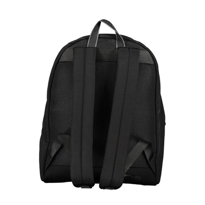 Travel Backpack by Tommy Hilfiger for men in polyester black features a architectural City Polyester Travel Backpack design with a secure zipper, ample external-pockets, internal-pockets & laptop-compartment, and versatile handle, backpack-strap & adjustable-strap for a architectural finish.