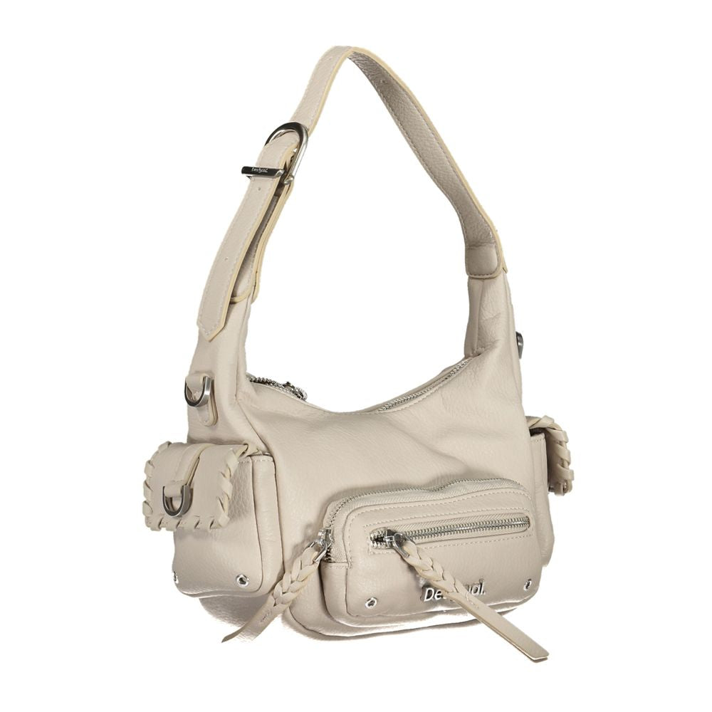 Handbag by Desigual for women in polyethylene white features an refined silhouette, showcasing a secure zipper, ample external-pockets & internal-pockets, and versatile shoulder-strap, handle & adjustable-strap for a sophisticated refined aesthetic.