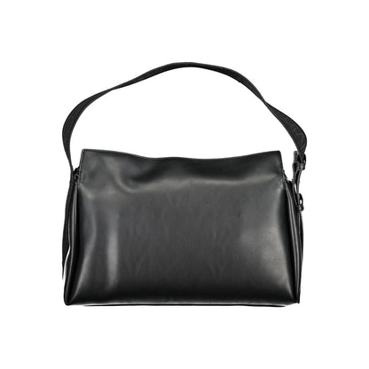 This Shoulder Handbag by Calvin Klein for women in polyester faux leather and black presents a sculptural silhouette featuring a secure zipper, ample document-holder, and versatile shoulder-strap, adjustable-strap & handle for a sculptural finish.