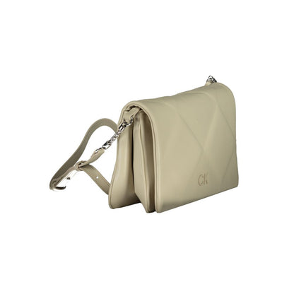 Crossbody Quilted Convertible Handbag by Calvin Klein for women in polyester faux leather beige presents a exquisite silhouette, showcasing a secure snap and organized built-in-compartments & cardholder with versatile crossbody-strap & adjustable-strap.