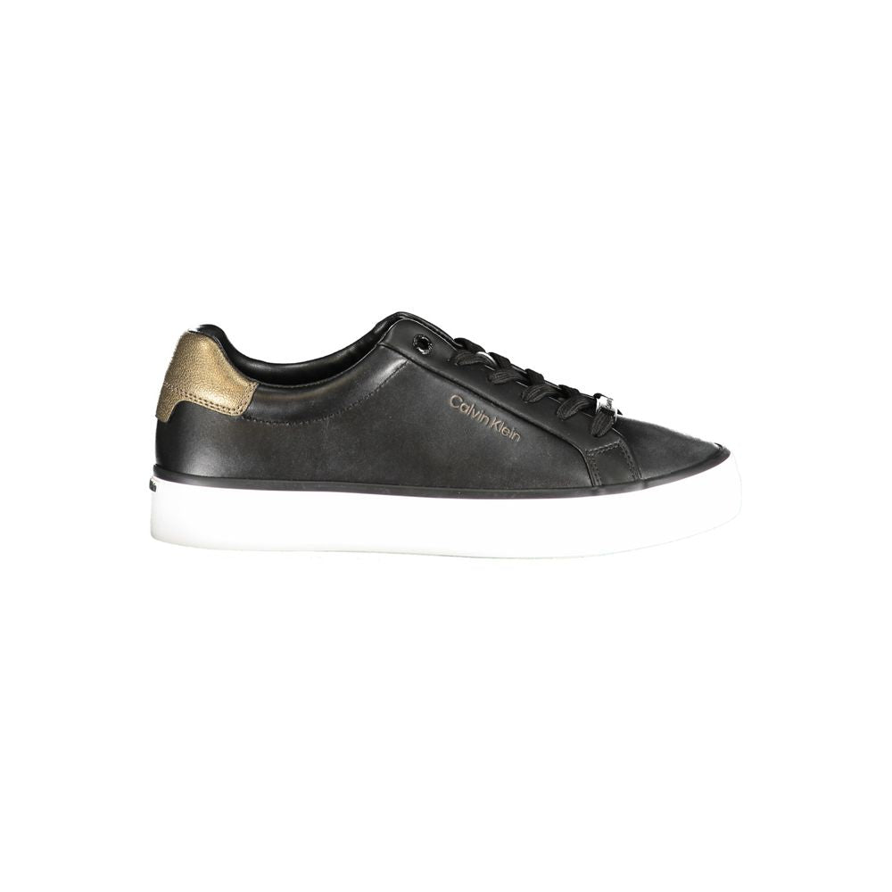 Sneakers by Calvin Klein for women in polyester black & print presents a sumptuous silhouette, artfully capturing the essence of the Women's Fashion Polyester Sneakers with its sumptuous fashion style design.