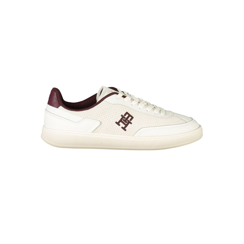 Sneakers by Tommy Hilfiger for women in polyester polyethylene leather beige, brown & signature presents a sumptuous silhouette from the Women's Low-Top Polyester Polyethylene Leather Sneakers collection, showcasing a sumptuous low-top style for an elevated aesthetic.
