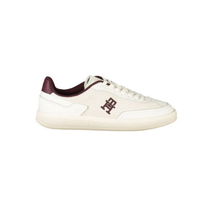 Sneakers by Tommy Hilfiger for women in polyester polyethylene leather beige, brown & signature presents a sumptuous silhouette from the Women's Low-Top Polyester Polyethylene Leather Sneakers collection, showcasing a sumptuous low-top style for an elevated aesthetic.