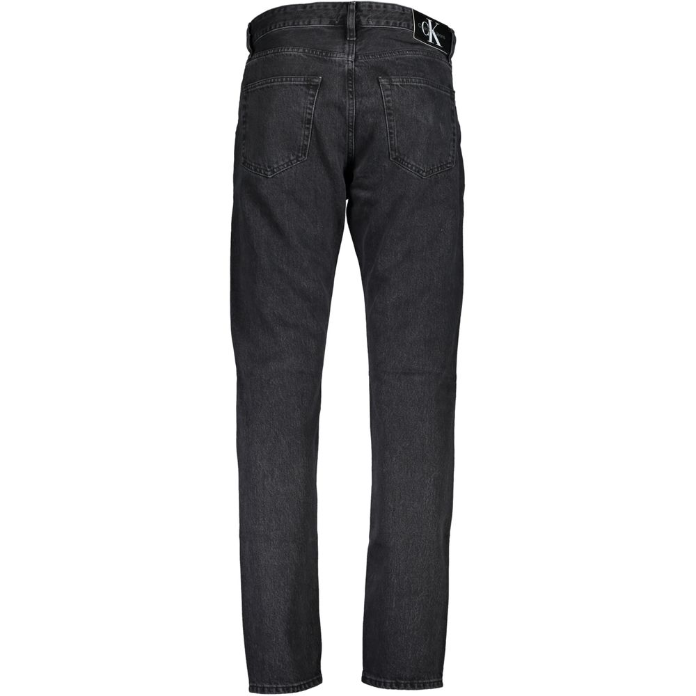 Pants by Calvin Klein for men in organic cotton denim black features an understated silhouette, showcasing a sophisticated and long with a refined for an understated, polished aesthetic.