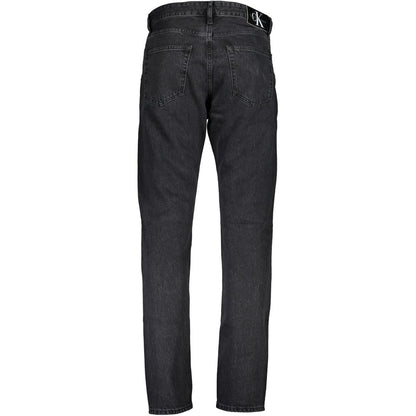 Pants by Calvin Klein for men in organic cotton denim black features an understated silhouette, showcasing a sophisticated and long with a refined for an understated, polished aesthetic.