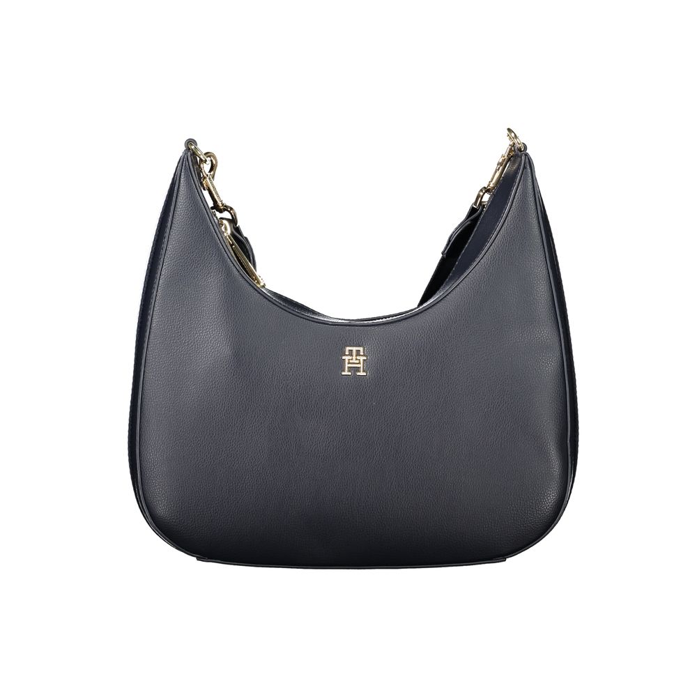 Shoulder Handbag by Tommy Hilfiger for women in polyester & polyurethane blue presents a ornamental silhouette, showcasing a secure zipper, ample internal-pockets, and versatile shoulder-strap, adjustable-strap & handle for a ornamental finish.