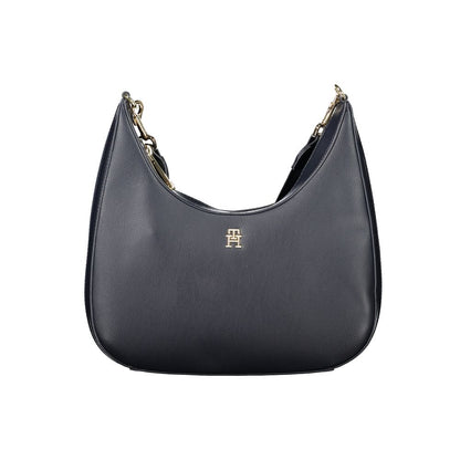 Shoulder Handbag by Tommy Hilfiger for women in polyester & polyurethane blue presents a ornamental silhouette, showcasing a secure zipper, ample internal-pockets, and versatile shoulder-strap, adjustable-strap & handle for a ornamental finish.
