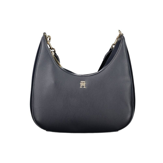 Shoulder Handbag by Tommy Hilfiger for women in polyester & polyurethane blue presents a ornamental silhouette, showcasing a secure zipper, ample internal-pockets, and versatile shoulder-strap, adjustable-strap & handle for a ornamental finish.