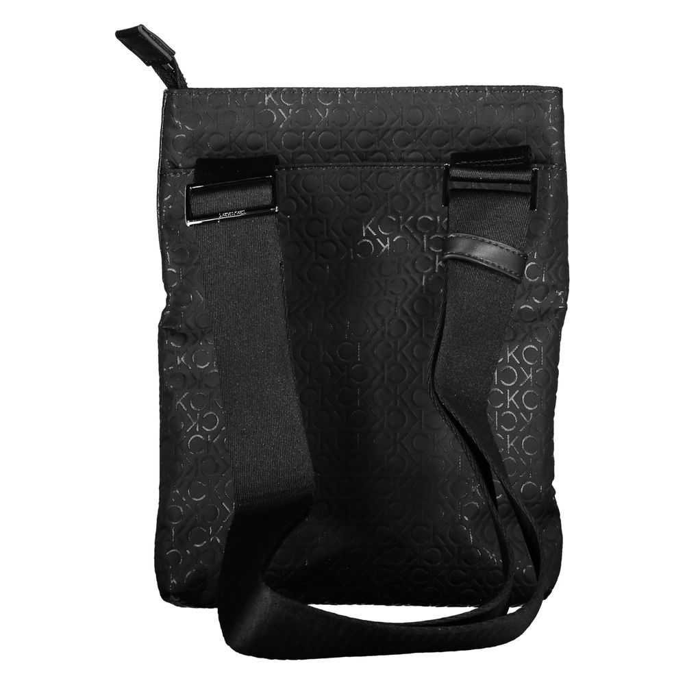 Shoulder Bag by Calvin Klein for men in polyester & polyethylene black features a effortless chic silhouette with a secure zipper, ample external-pockets & internal-pockets, and versatile shoulder-strap & adjustable-strap for a effortless chic finish.
