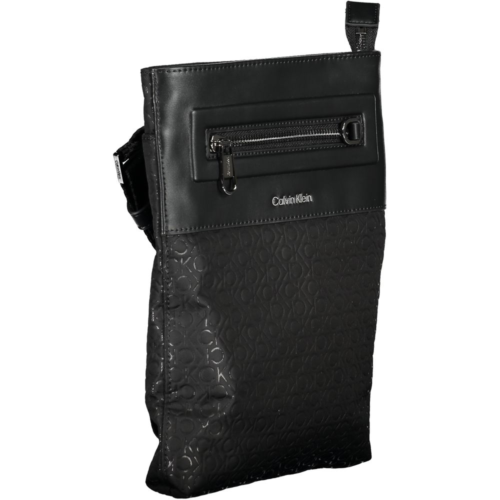 Shoulder Bag by Calvin Klein for men in polyester & polyethylene black features a effortless sophistication silhouette, secured by a zipper with ample external-pockets & internal-pockets and versatile shoulder-strap & adjustable-strap for a effortless sophistication finish.