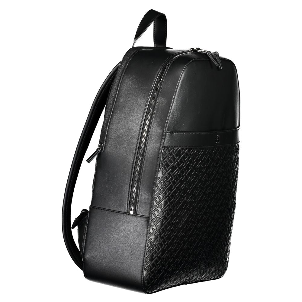 Travel Backpack by Tommy Hilfiger for men in polyethylene black showcases an architectural Urban Traveler Polyethylene Travel Backpack design, featuring a secure zipper, ample external-pockets, internal-pockets & laptop-compartment, and architectural handle, backpack-strap & adjustable-strap for a sophisticated look.