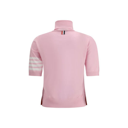 Sweater by Thom Browne for women in virgin wool multicolor & patterned showcases a sumptuous silhouette, artfully finished with a sumptuous turtle neckline and for a sophisticated, sumptuous look.