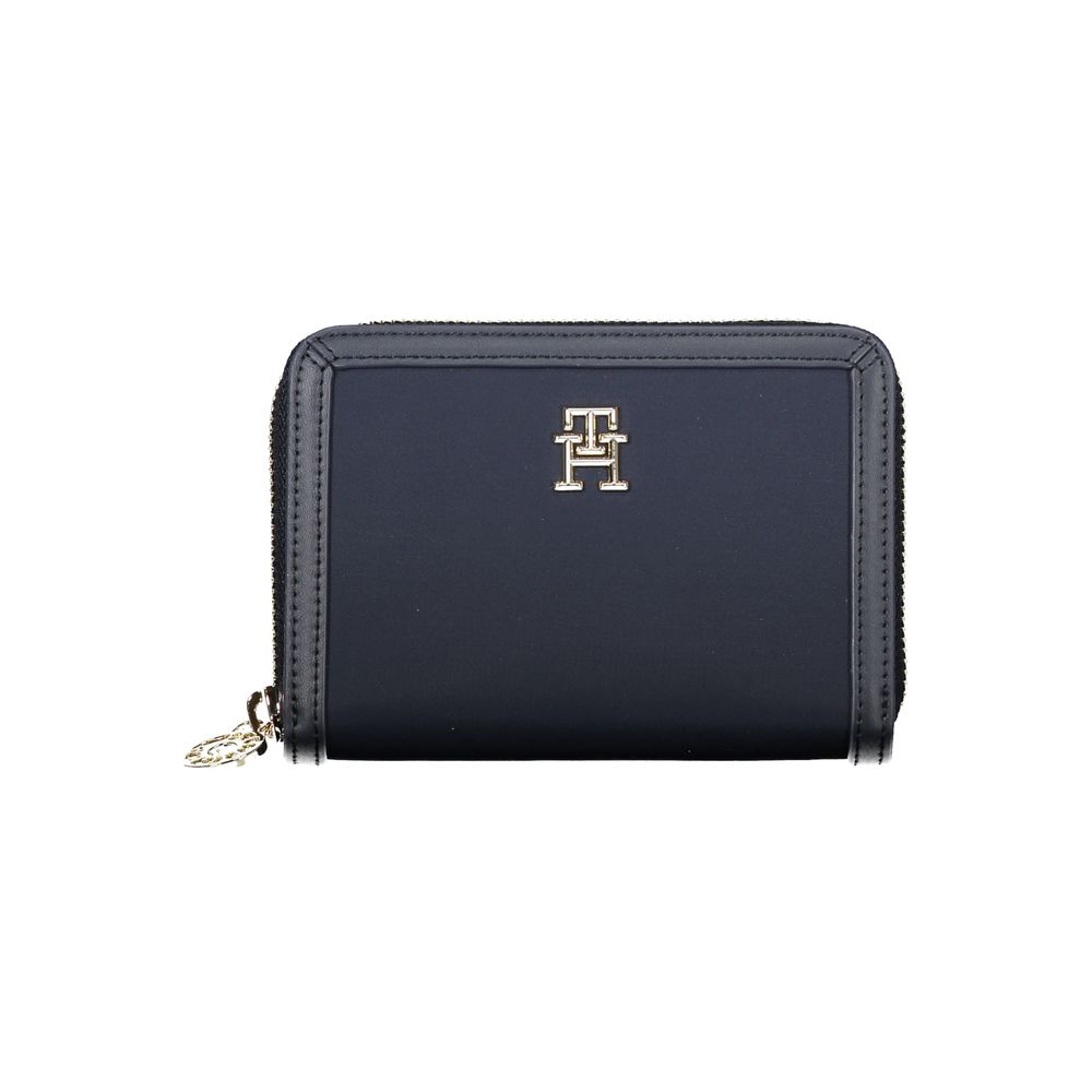 Wallet by Tommy Hilfiger for women in polyester & polyethylene blue showcases a refined silhouette, artfully capturing the essence of the refined Polyester & Polyethylene Wallet design with functional eco-friendly coin-purse.